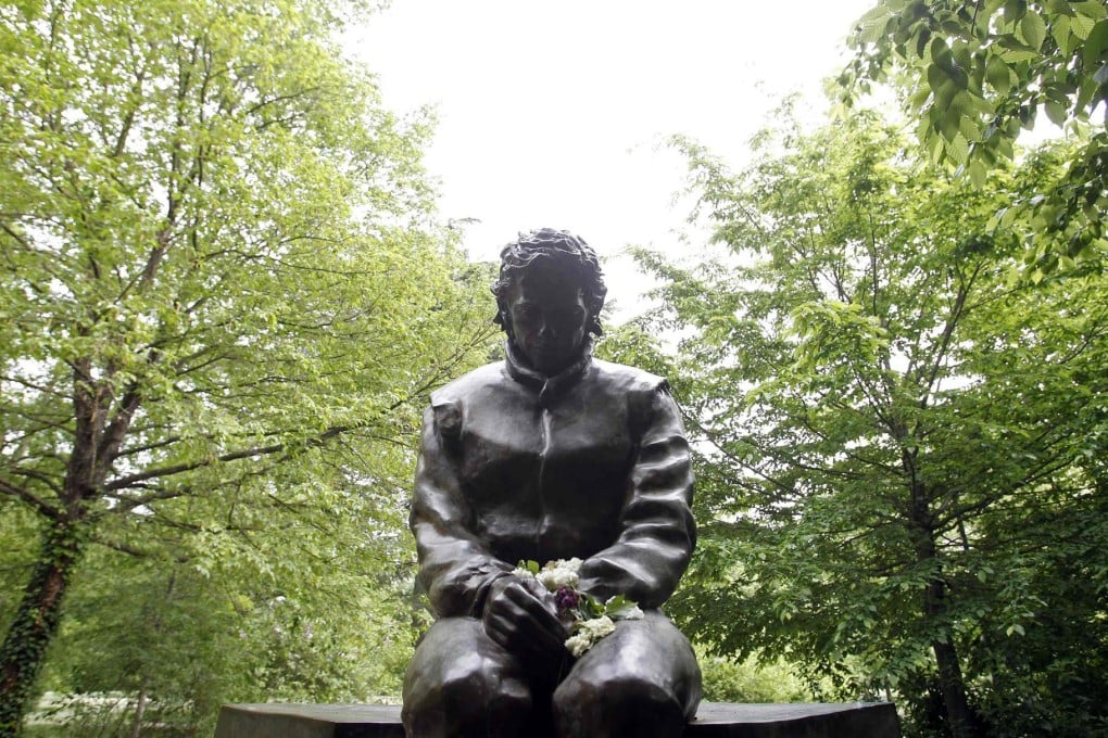 A memorial statue of Brazilian F1 driver Ayrton Senna is seen in the park inside the race track at Imola. Photo: Reuters