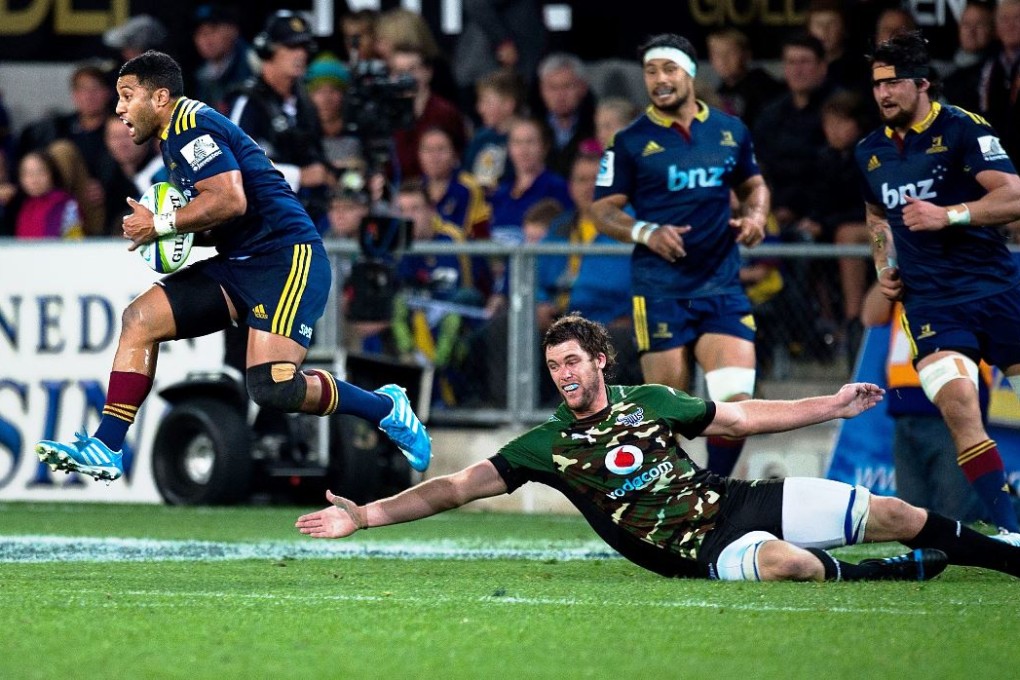 Highlanders fly-half Lima Sopoaga, shown here slipping the Bulls defence during a recent game in Dunedin, didn’t miss a shot at goal against the Sharks in Durban. Photo: AFP