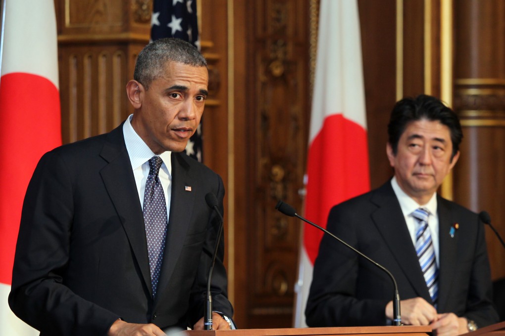 US President Barack Obama (left) attends a press conference with Japanese Prime Minister Shinzo Abe at the Akasaka guesthouse in Tokyo. Photo: Xinhua