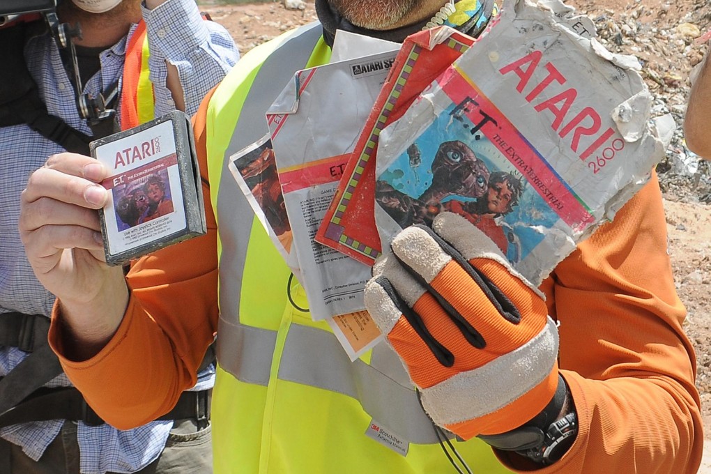 A worker shows what he found in the New Mexico landfill. Photo: Reuters