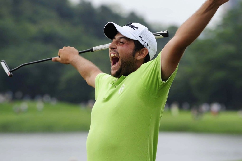 Alexander Levy celebrates after his birdie at the last hole to win the 20 million yuan Volvo China Open. Photo: Reuters