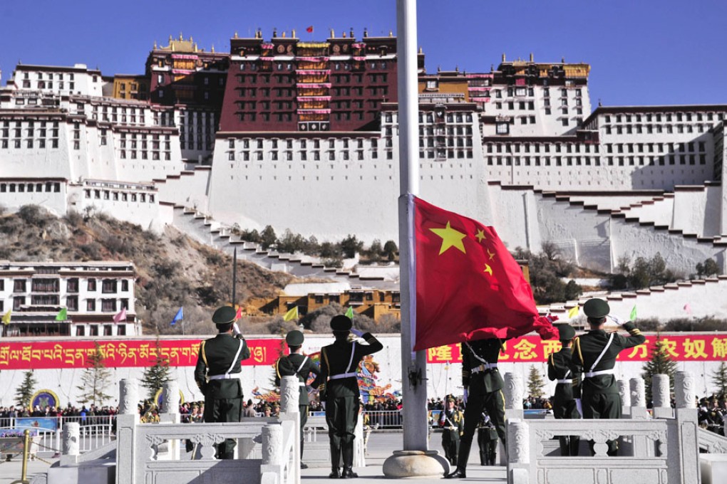 A flag-raising ceremony in Lhasa, capital of Tibet Autonomous Region.