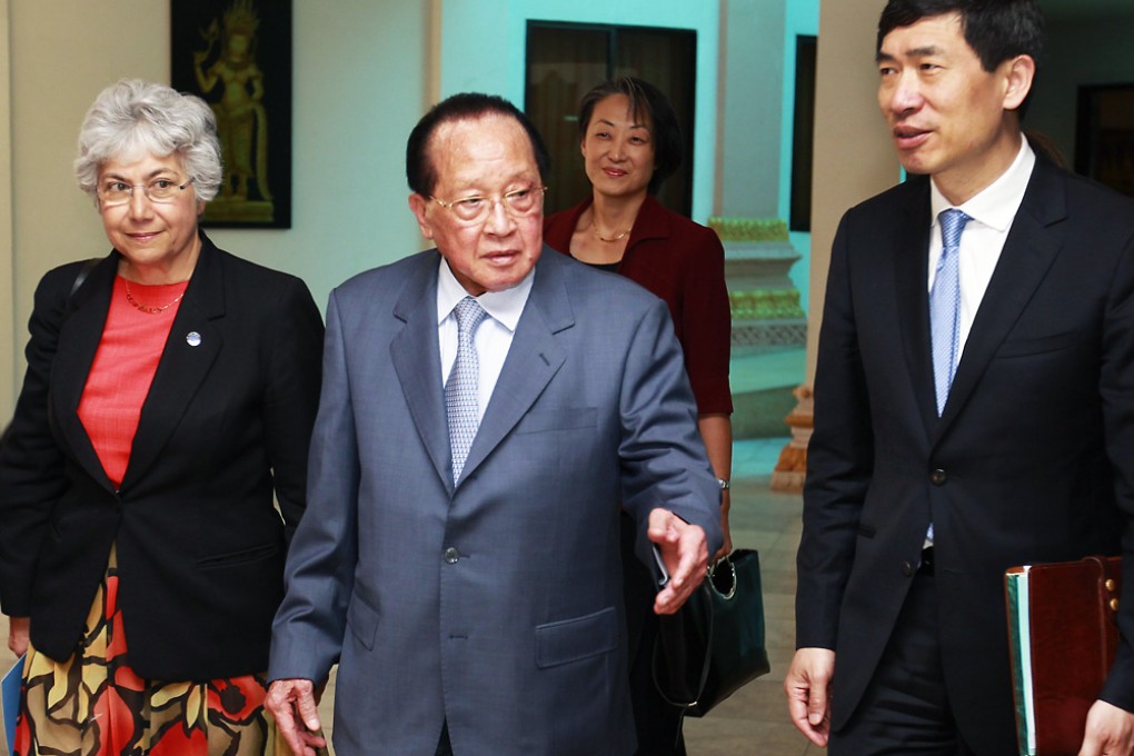 Flavia Pansieri (from left), UN Deputy High Commissioner for Human Rights; Hor Namhong, Cambodian Minister of Foreign Affairs and International Cooperation, and Haoliang Xu, Assistant Administrator, United Nations Development Programme, attend a meeting in Phnom Penh, Cambodia. Photo: EPA