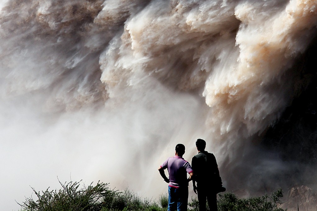 Water gushes out of the Liujiaxia Hydropower Station on the Yellow River in Yongjing county, Gansu province. Photo: Xinhua