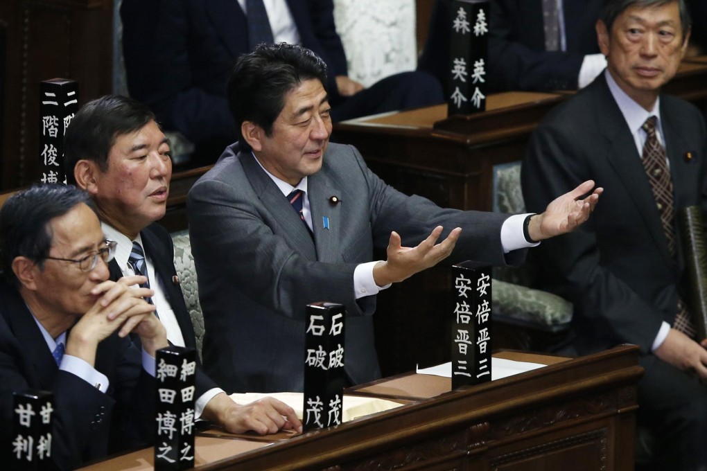 Shinzo Abe (centre) has seen relations with China sour. Photo: Reuters