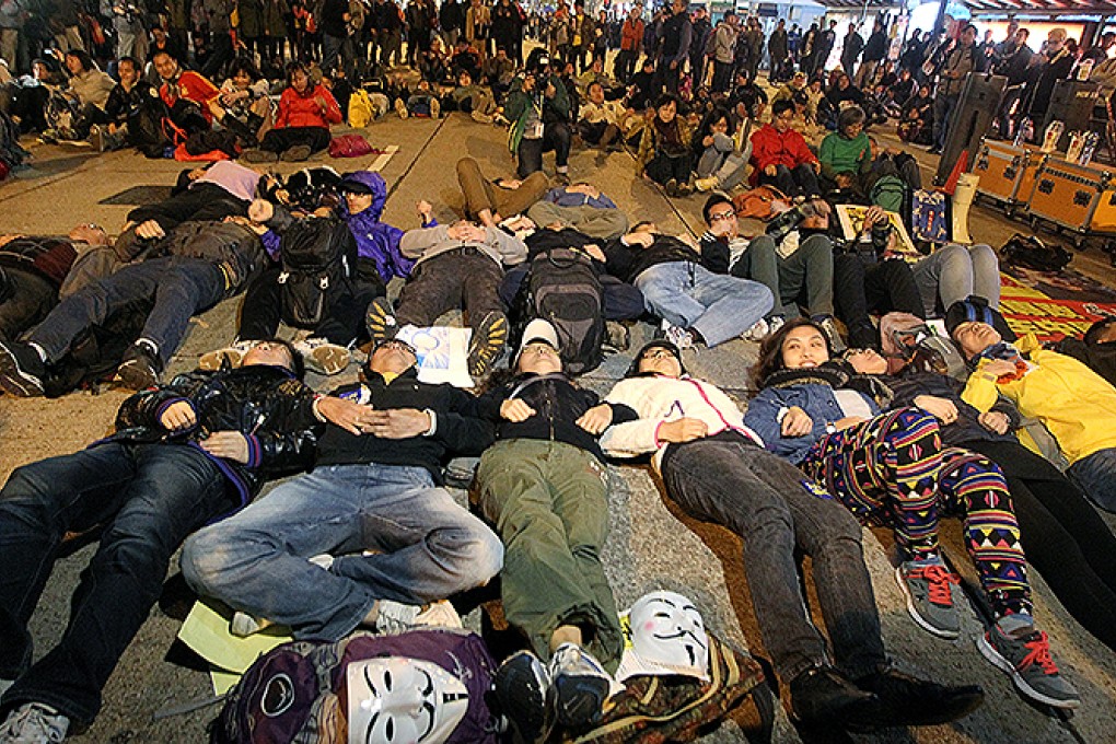 Occupy Central protesters block roads after the New Year''s Day march. Photo: Sam Tsang