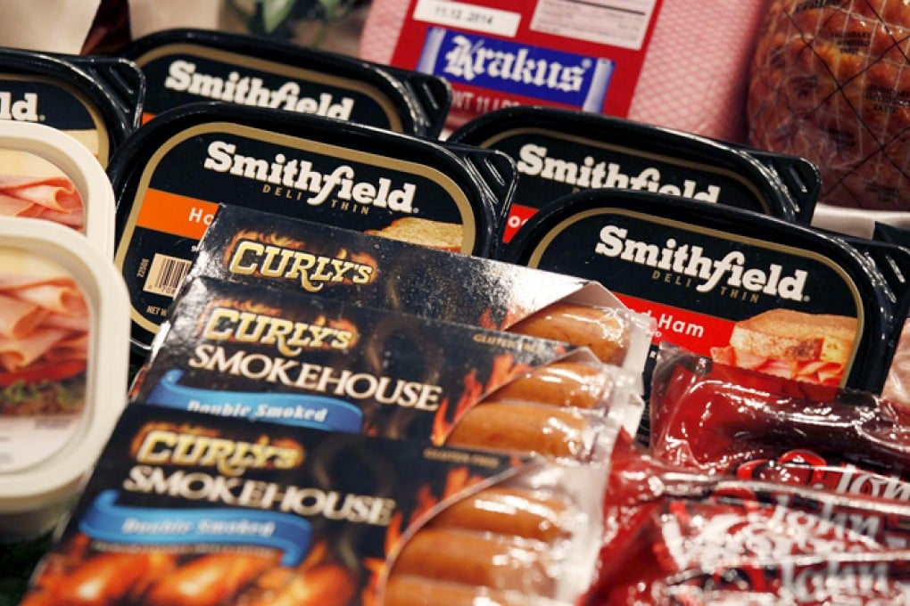 Smithfield Foods is now part of the renamed WH Group, which has postponed its initial public offering. Photo: Reuters