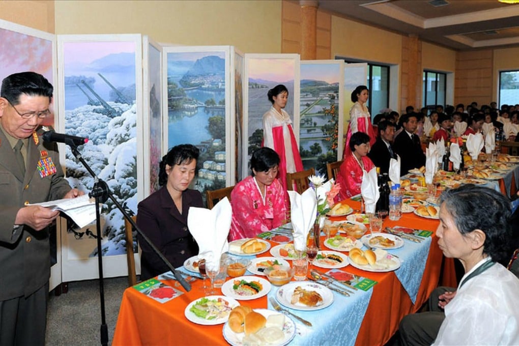 Hwang Pyong-so, at left, was described in an official news report on May Day celebrations as the director of the Korean People's Army, replacing Choe Ryong-hae. Photo: KCNA/EPA
