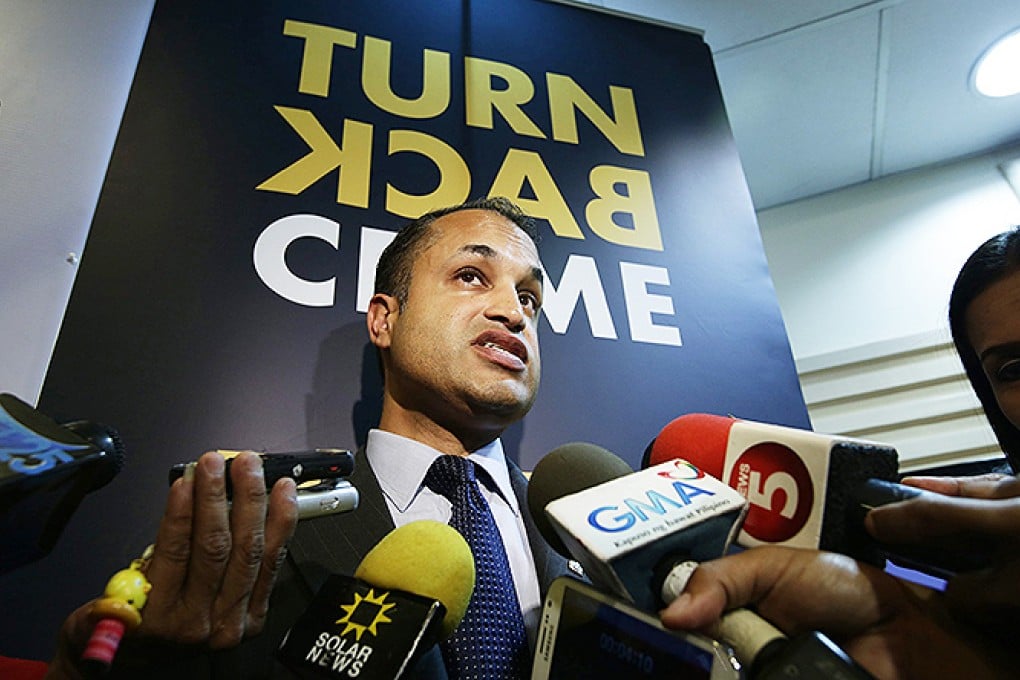 Sanjay Virmani, director of the Singapore-based Interpol Digital Crime Centre, speaks to the press in Manila about the online 'sextortion' scheme. Photo: EPA