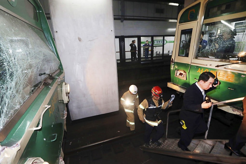 The two damaged subway trains at the point of collision. Photo: Reuters