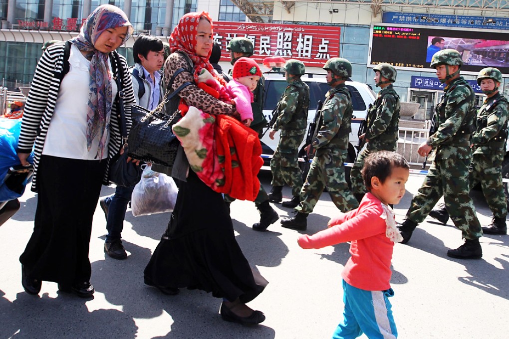 A heavy security presence outside Urumqi railway station, the scene of Wednesday's bomb and knife attack. Photo: Simon Song