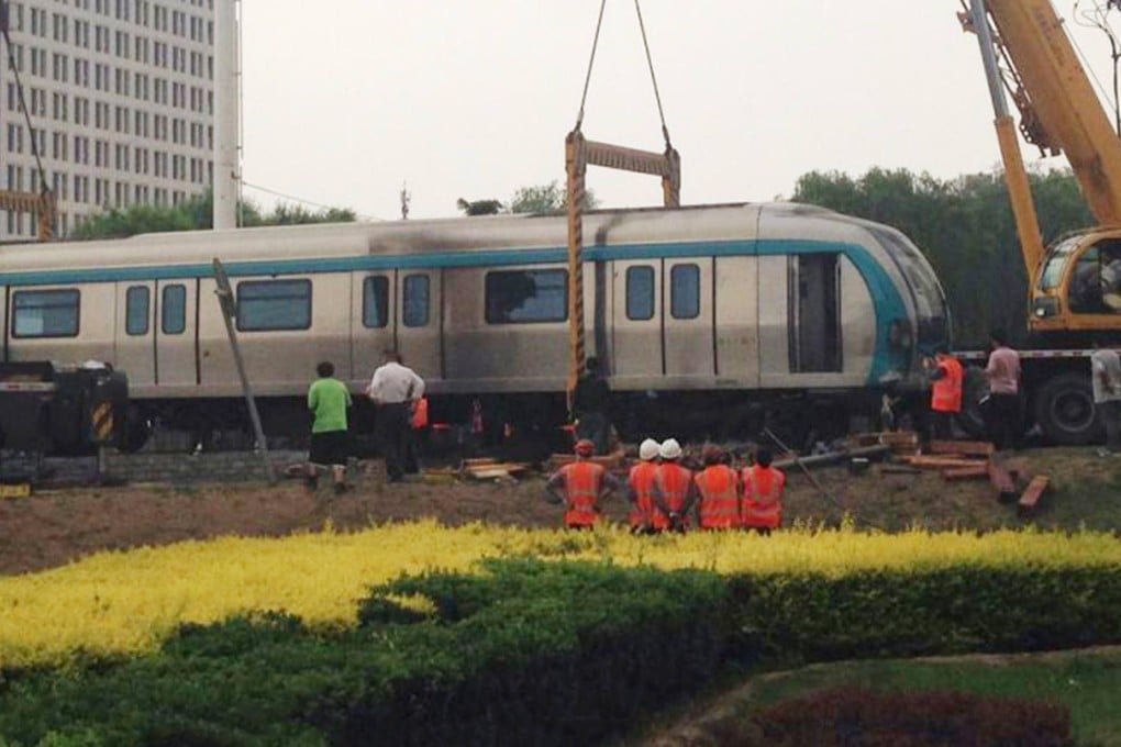 The train derailed during testing of an overground section of Beijing subway Line 4.