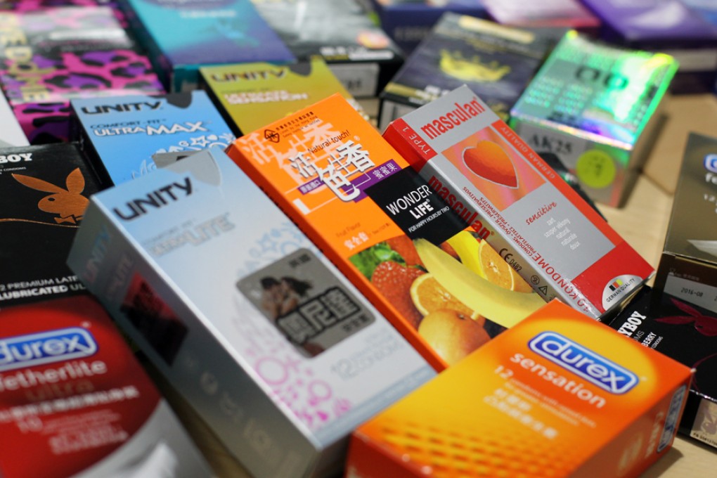 Young clubbers can now get free condoms as part of an anti-Aids campaign that aims to promote safe sex among the youth. Photo: Dickson Lee