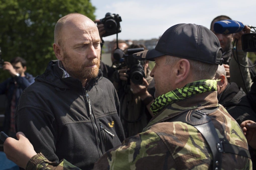 Foreign observer Colonel Axel Schneider (left) was freed. Photo: AP