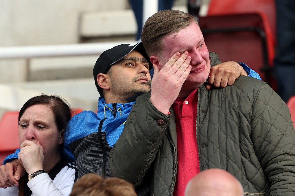 Despair for Fulham fans as their side are relegated from the English Premier League after losing 4-1 at Stoke. Photo: AFP