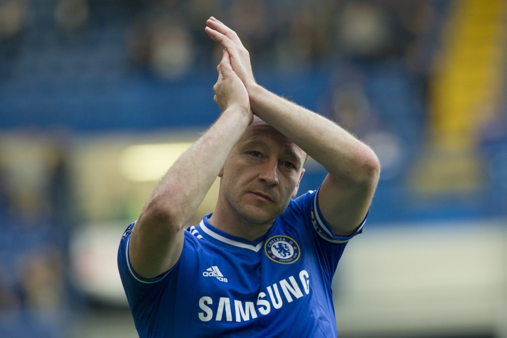 John Terry applauds the Stamford Bridge fans for perhaps the last time as a Chelsea player. Photo: AP