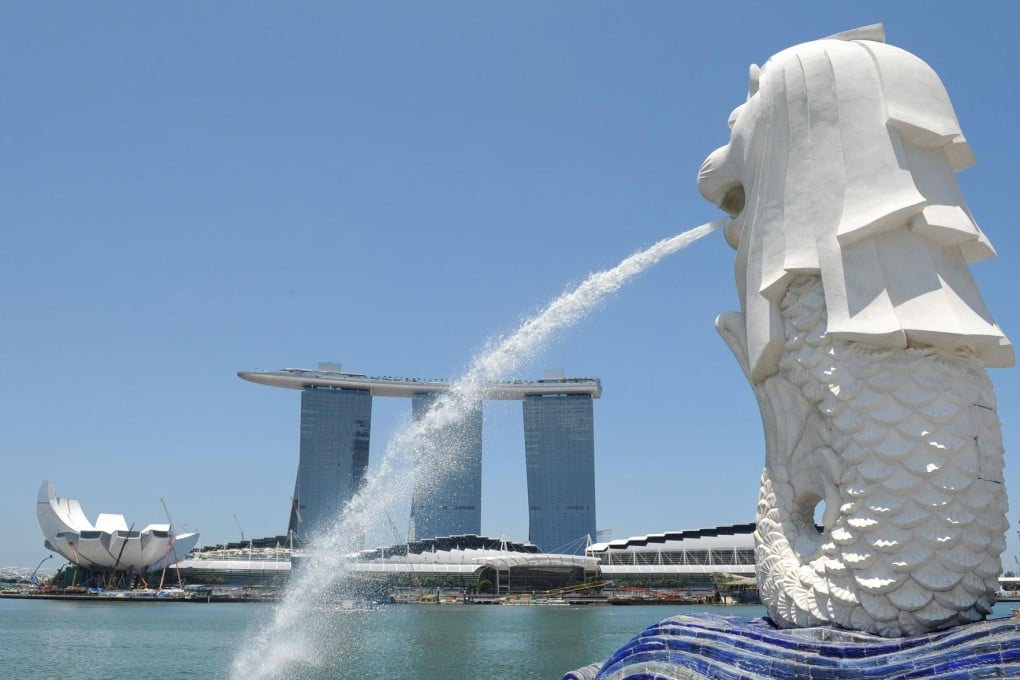 The agreement with Fatca will allow Singapore firms to report US account-holder information to their local tax authority. Photo: AFP