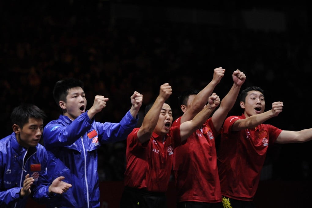 Chinese players celebrate during the men's team final against Germany at the world championships in Tokyo. China's dominance is a worry for the code's chiefs. Photo: Xinhua
