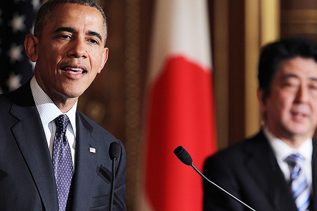 US President Barack Obama attends a press conference with Japanese Prime Minister Shinzo Abe at the Akasaka guesthouse in Tokyo. Photo: AFP