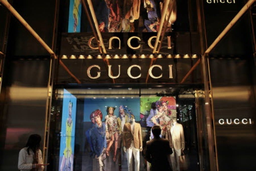 Luxury goods from Gucci are among the items going on sale. Photo: Reuters