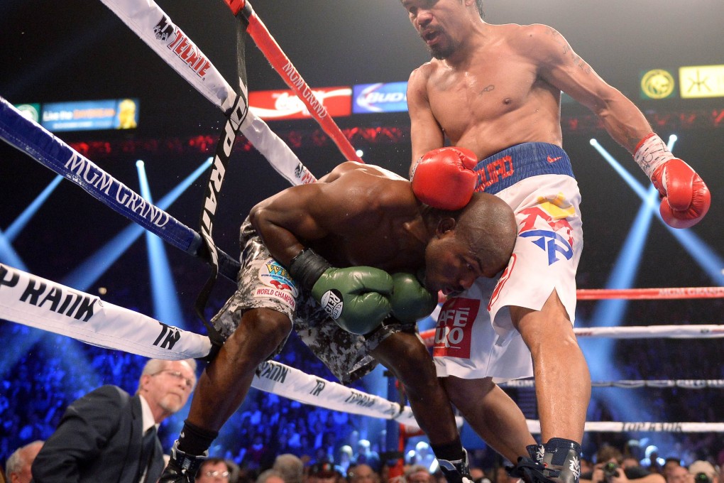 Manny Pacquiao (right) has been itching to fight Floyd Mayweather Jnr for years. Photo: AFP