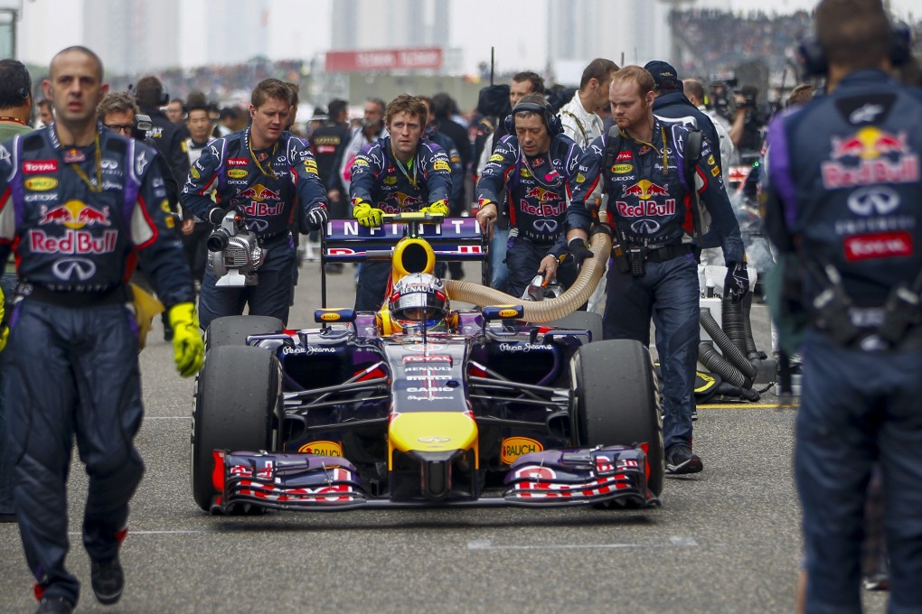 Australian Formula One driver Daniel Ricciardo of Red Bull arrives at the grid before the start of the Chinese Formula One Grand Prix. Photo: EPA
