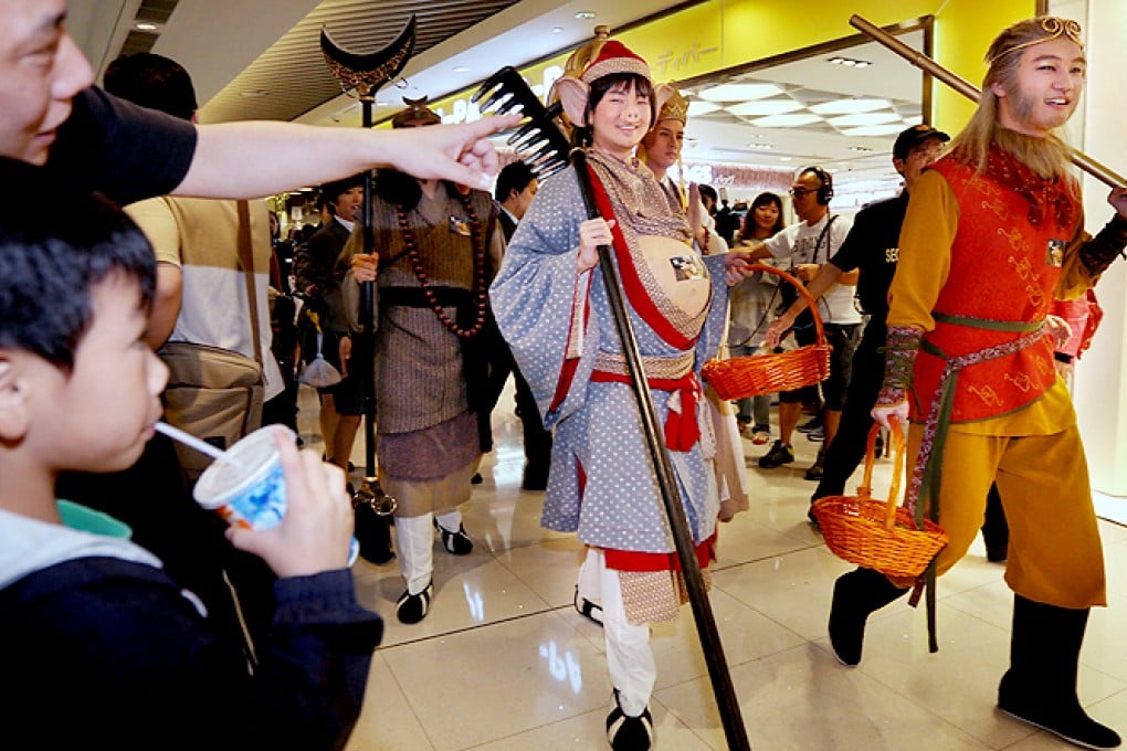 TVB actors Jarryd Tam, playing the Monkey King, and Milkson Fong, playing Pigsy, promote Journey to the West at a mall. Photo: Nora Tam