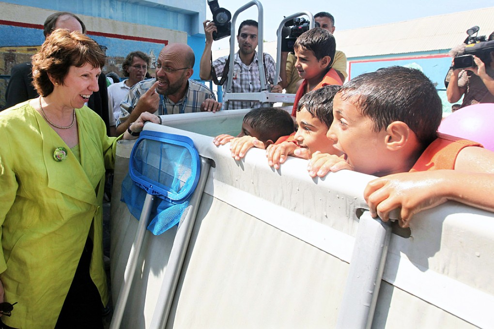 EU foreign affairs chief Catherine Ashton (left) visits a United Nations-run summer camp in Gaza City in 2010. Photo: Reuters