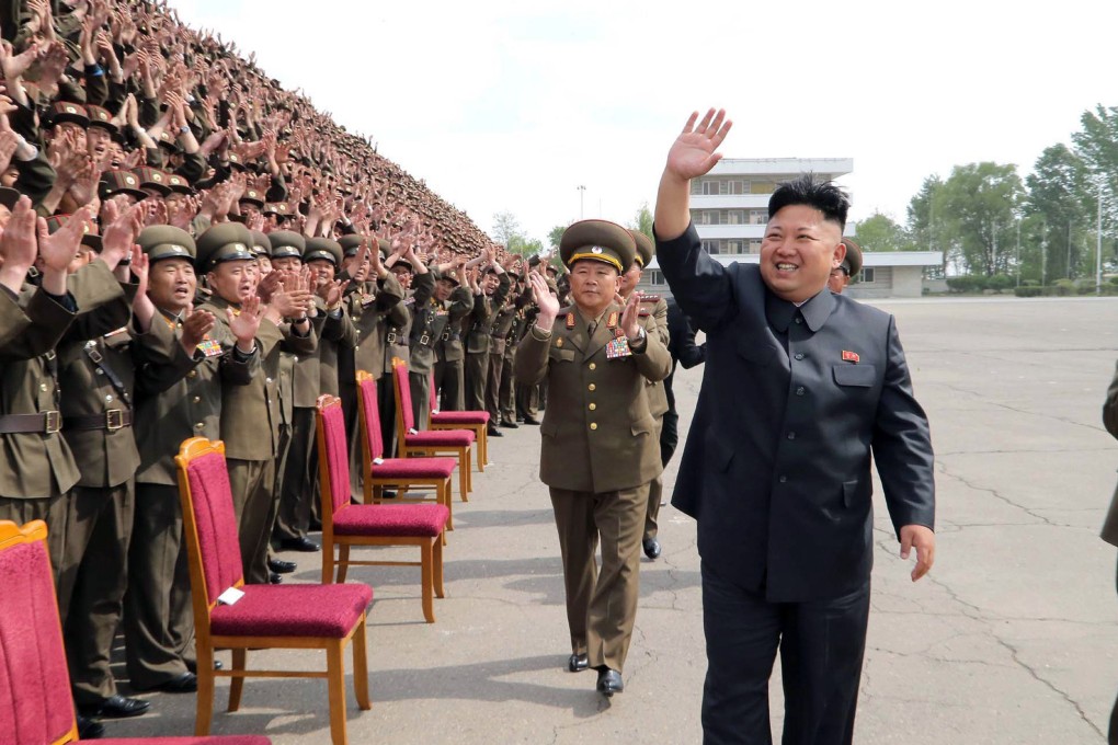 Kim Jong-un waves to soldiers of the North Korean People's Army. Photo: AFP