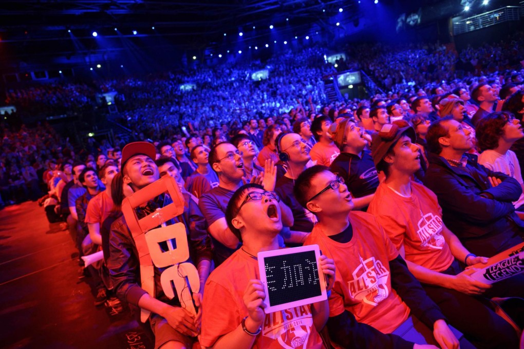 Excited gaming fans cheer for the various international competitors during the League of Legends championship in Paris, which was won by a South Korean team. Photo: AFP