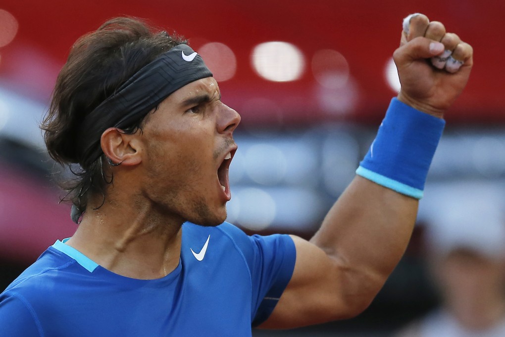 Rafael Nadal is pumped up after winning a point against Japan’s Kei Nishikori during the Madrid Open. Photo: AP