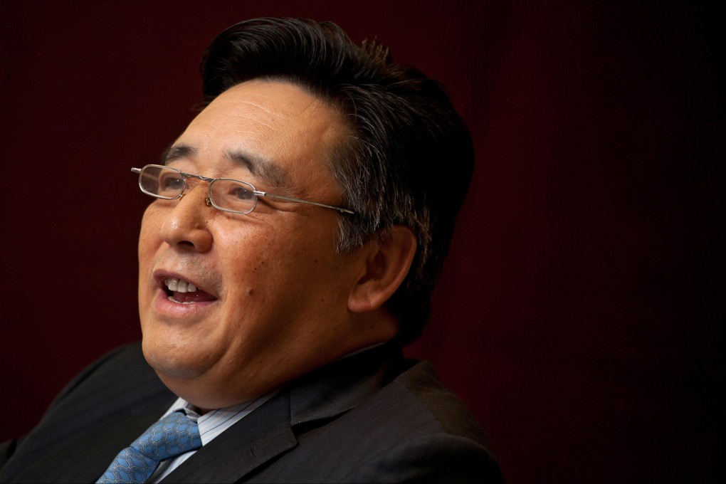 Chief executive Chen Xiaoping says China Everbright has 37 projects being built involving 12.7 billion yuan of investment. Photo: Bloomberg