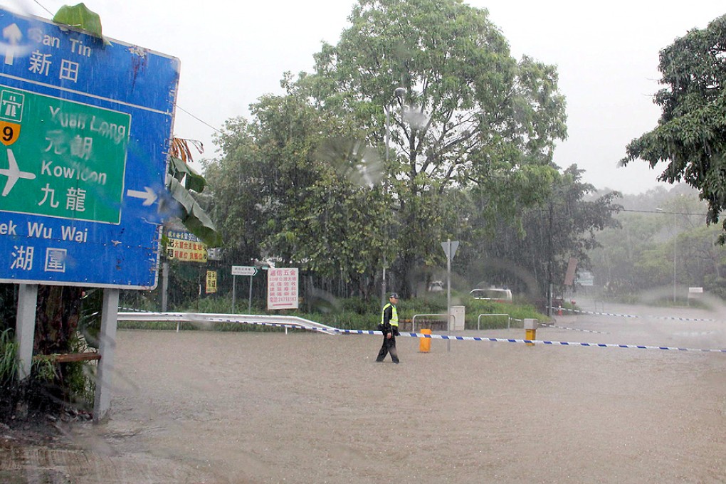 A flooded crossroad at Shek Wu Wai village. Photo: SCMP