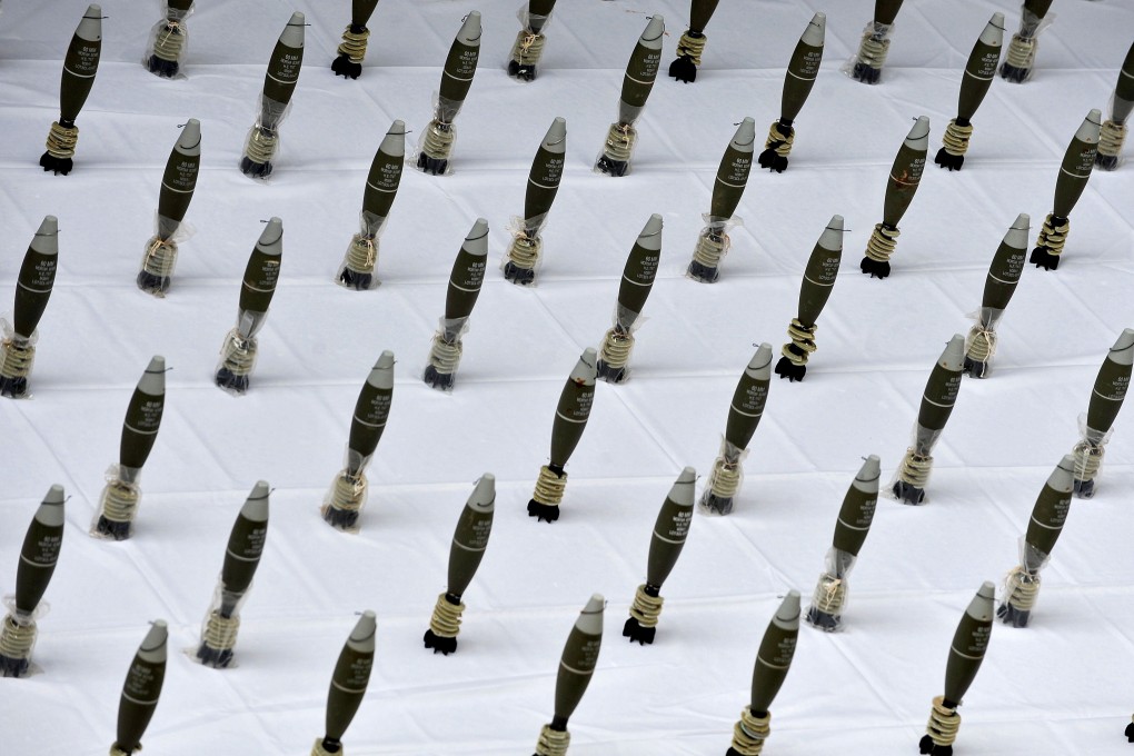 Eight armed Chinese men were arrested last month near Tamu after an alleged killing. They were said to have received military training in the Kokang region of Myanmar, which shares a border with China. Photo: AFP