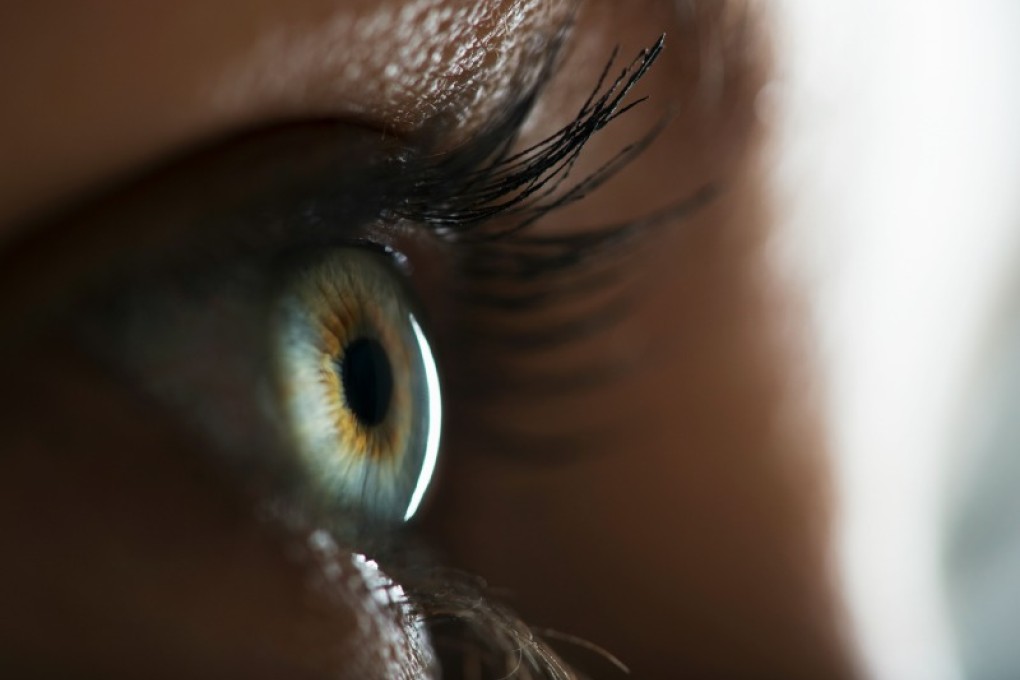 The lenses are designed to press on certain parts of the cornea. Photo: Tetra Images/Corbis