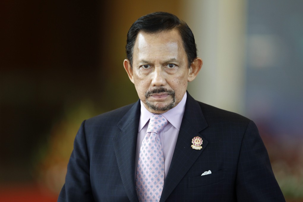 Sultan Hassanal Bolkiah is implementing a sharia law that includes death by stoning and flogging for crimes in Brunei such as abortions and adultery. Photo: EPA