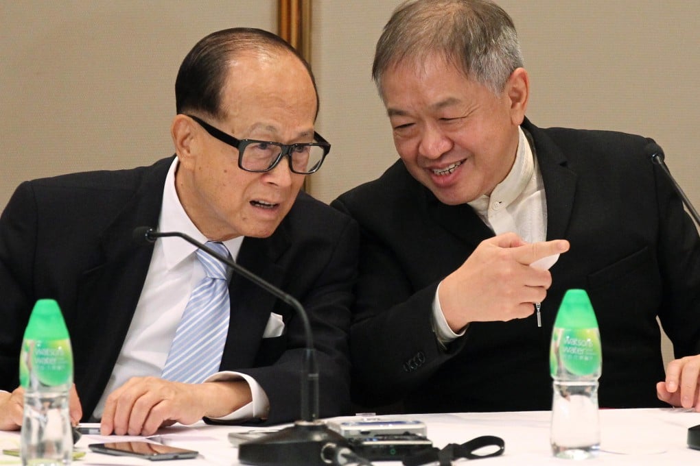 Li Ka-shing is the clear leader of his empire, even though he appears to share credit with Canning Fok Kin-ning. Photo: SCMP