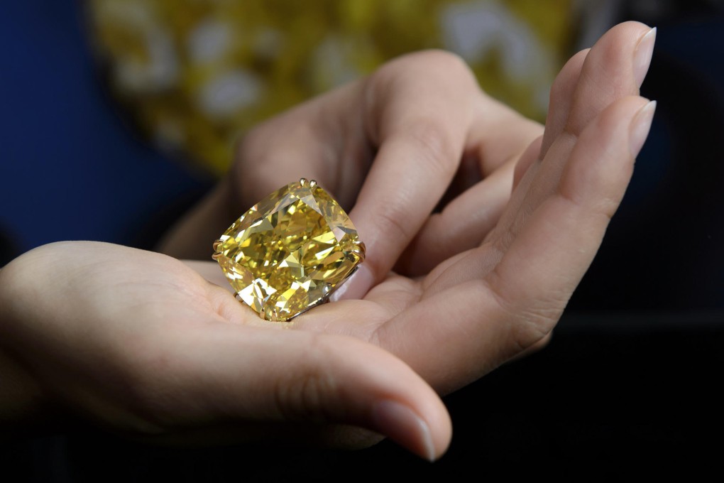 The massive yellow diamond sold by Sotheby's. Photo: AP