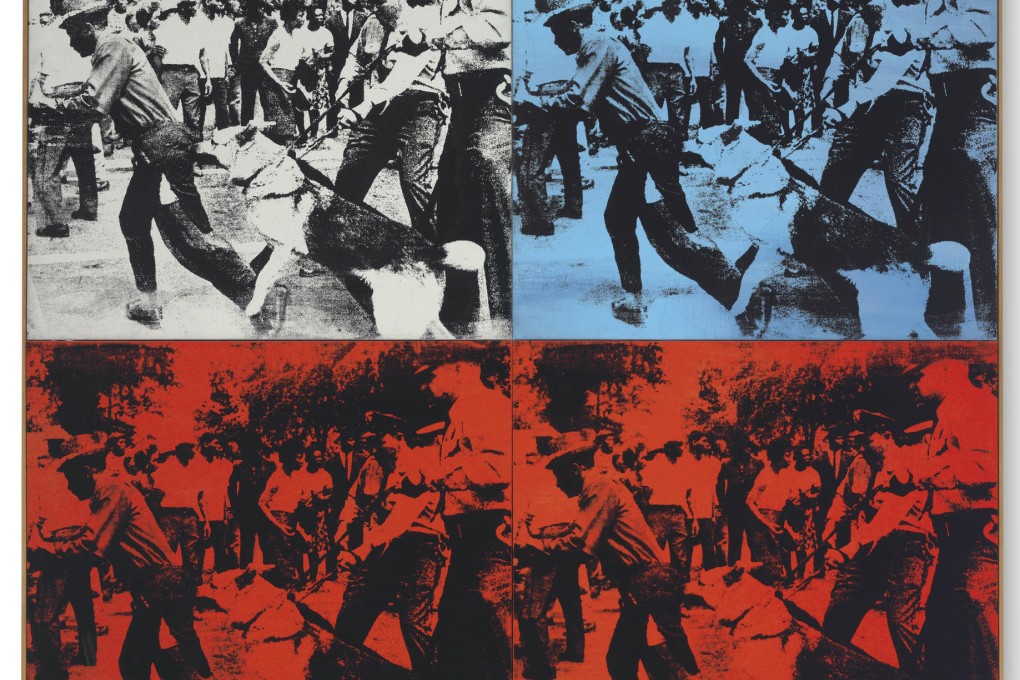 Andy Warhol's Race Riot, painted with acrylic and silkscreen ink on linen, which sold at Christie's auction in New York. Photo: AP