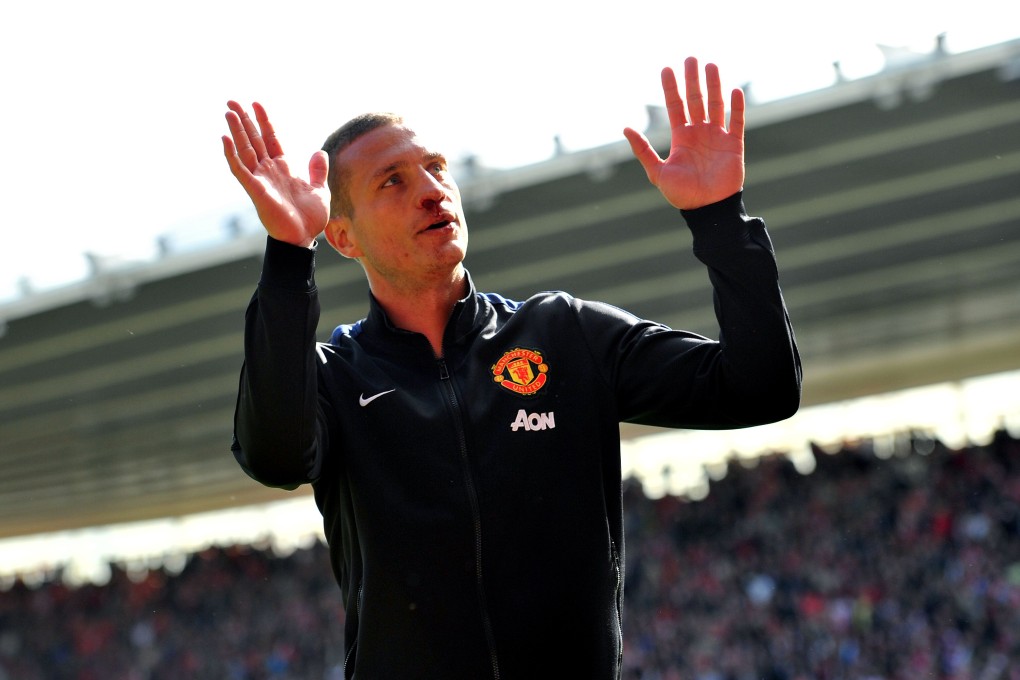 Nemanja Vidic thanks the fans after his final game for United. Photo: AFP