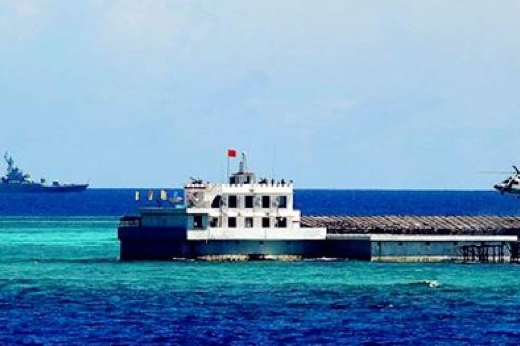 The Philippines says China is constructing an airstrip on reclaimed land at Johnson Reef in the Spratly Islands. Photo: Screenshot