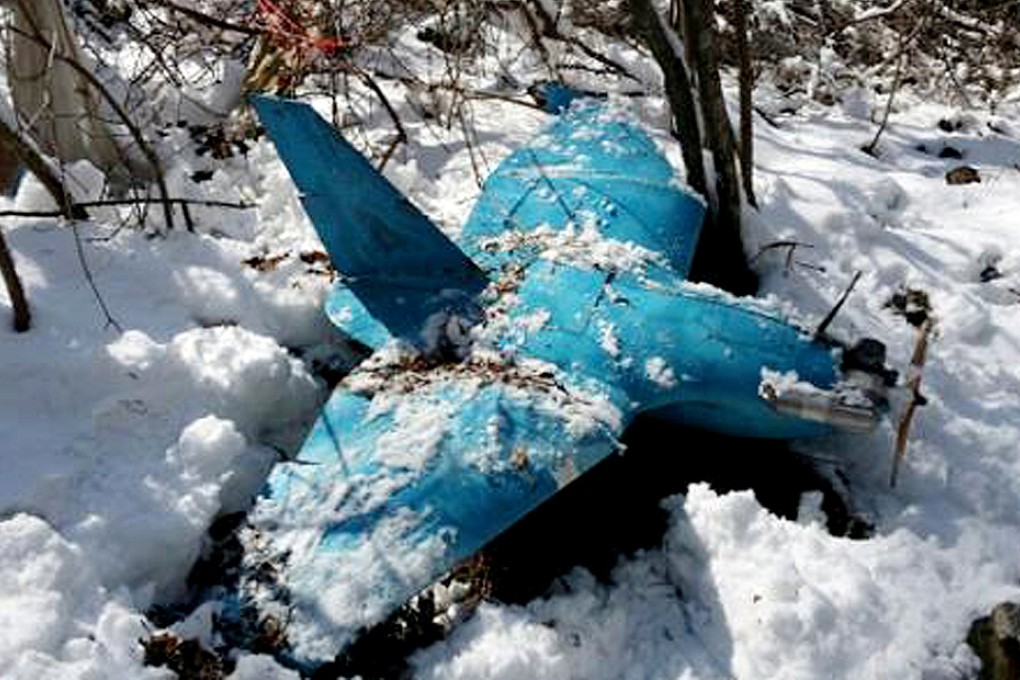 A crashed unmanned drone lies on a mountain in Samcheok, South Korea. Photo: AP