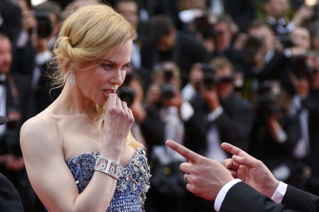 Nicole Kidman poses on the red carpet in Cannes as she arrives for the screening of the much-criticised film Grace of Monaco.Photo: Reuters