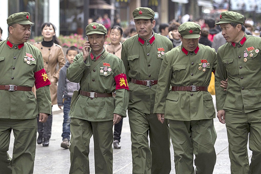Chinese war veterans wear old uniforms in a southwestern province. To justify a ban on names, the Guangzhou watchdog has invoked old party directives favouring the word 'comrade' for salutations. Photo: Reuters