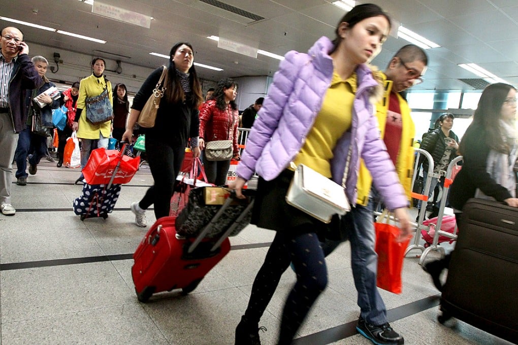 A growing number of mainlanders are trying to exploit a loophole by travelling to Hong Kong without permits and pretending to be in transit. Photo: Felix Wong