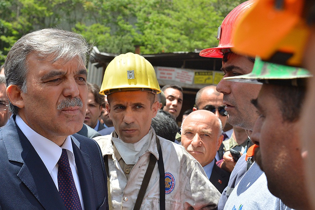Turkish President Abdullah Gul visits mine workers and relatives after a coal mine explosion in Soma. Photo: EPA
