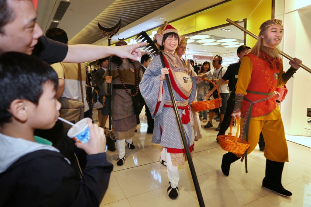 TVB actors Jarryd Tam, playing the Monkey King, and Milkson Fong, playing Pigsy, promote Journey to the West at a mall. Photo: Nora Tam