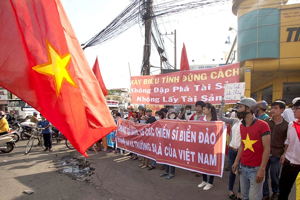 Workers protest at an industrial zone in Binh Duong province. Thousands of Vietnamese set fire to foreign factories and rampaged in industrial zones in anti-Chinese protests. Photo: Reuters