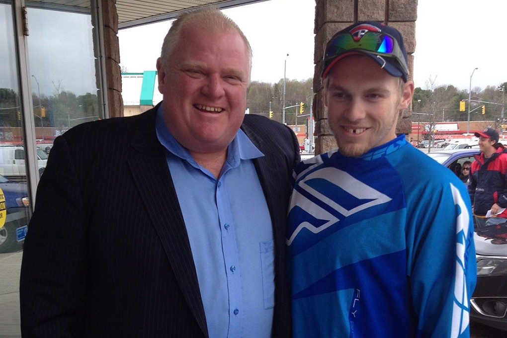 Toronto Mayor Rob Ford poses for a photo with Brody Lisle in Bracebridge, Ontario, on Friday. Photo: AP