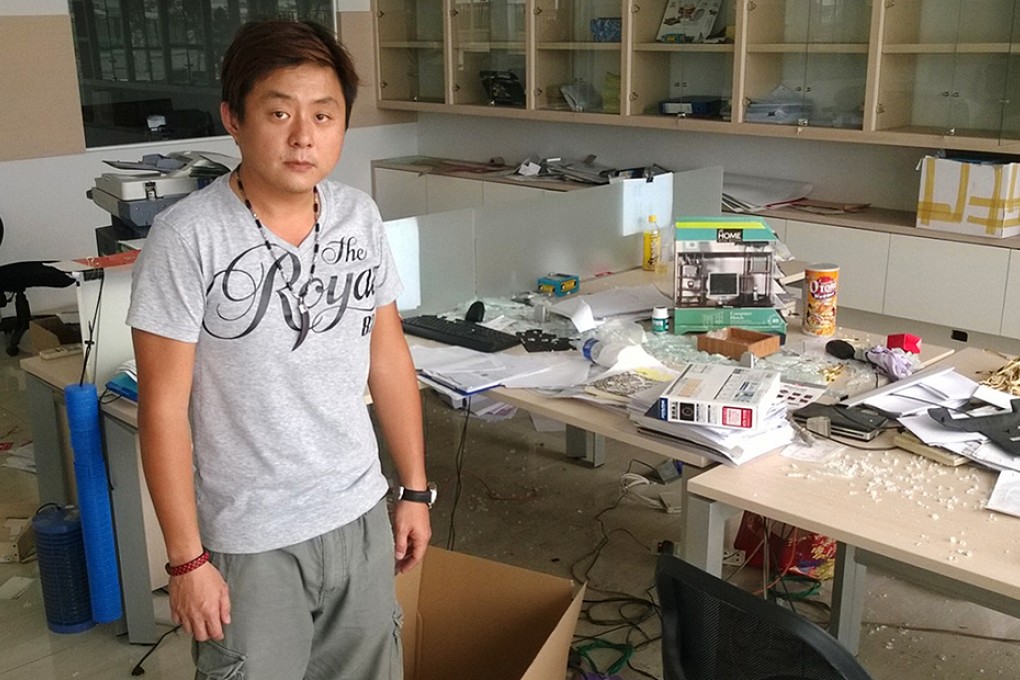 Jeff Lin, sales and marketing executive of Wei Lung Print and Packaging seen standing in his looted company office in Binh Duong on the outskirts of Ho Chi Minh City on Friday. Photo: Patrick Boehler SCMP